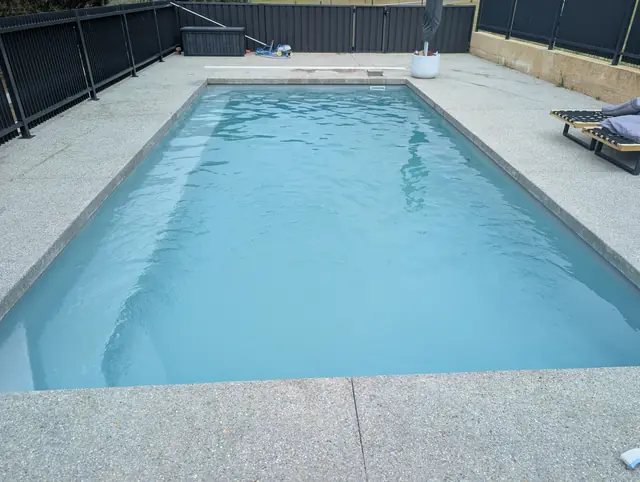 The same pool from the side with clear light blue water